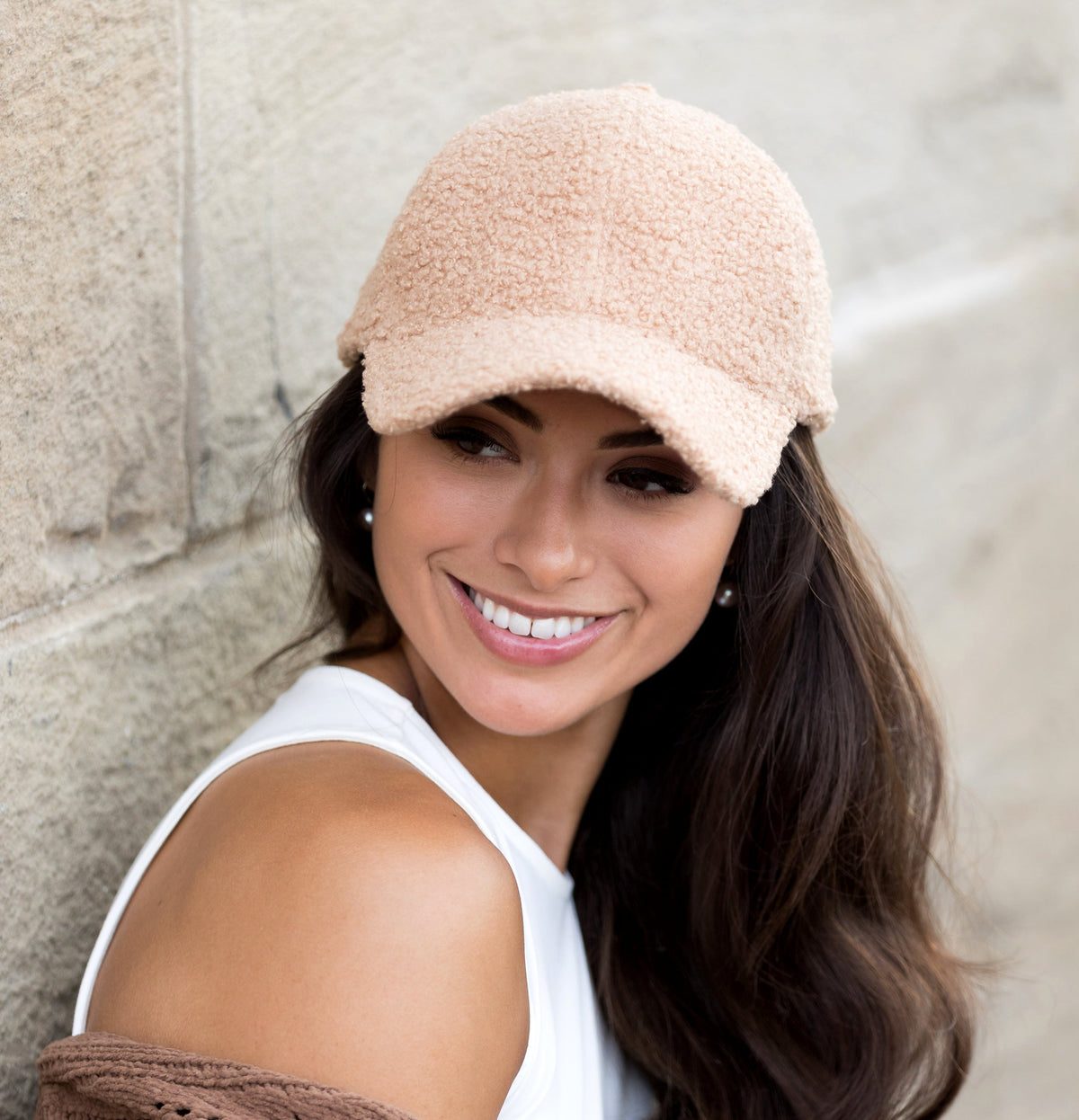 Light camel textured baseball cap shown from the front.