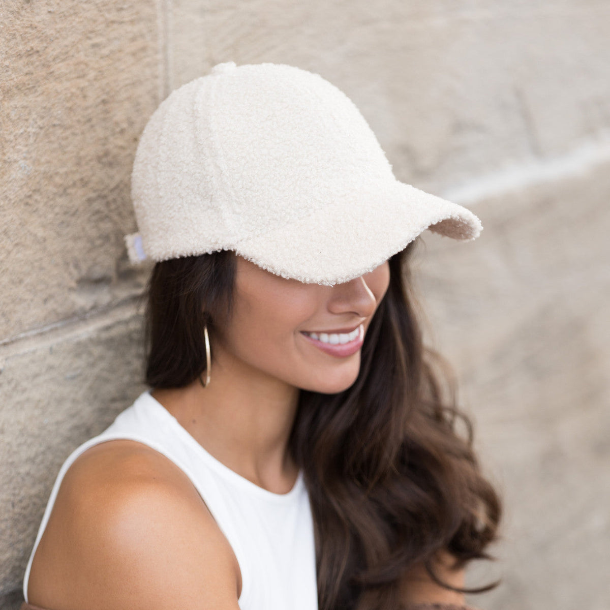 Beige textured baseball cap shown from the side.