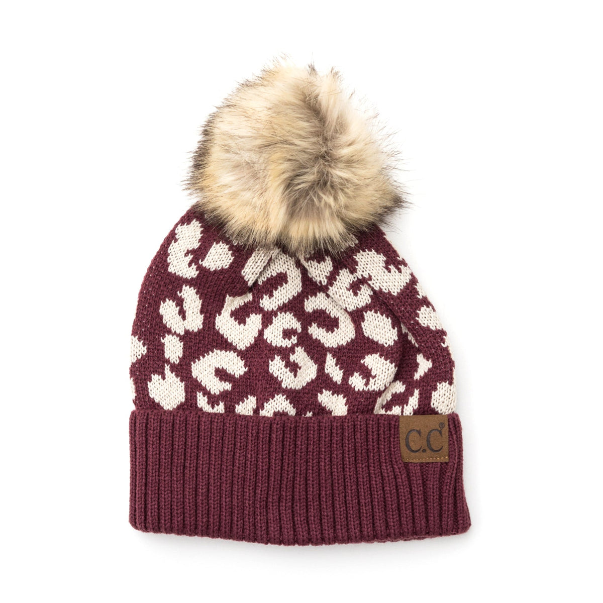 Burgundy leopard-pattern beanie with a brown pom on a white background.