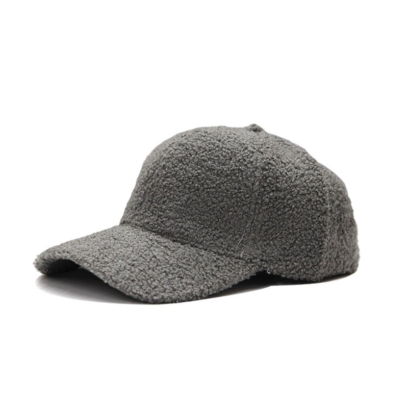 Grey textured baseball cap on a white background.