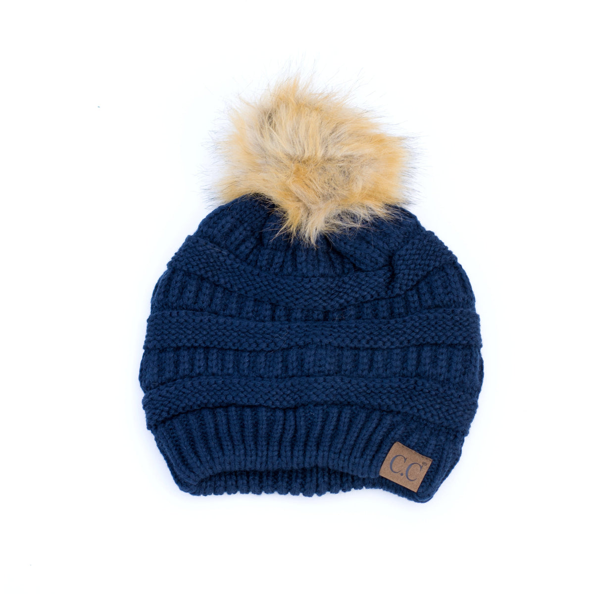 Navy textured knit pom beanie shown flat.