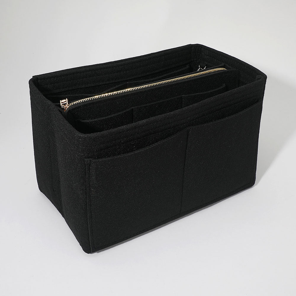 Black handbag organizer insert with front pockets and a zippered compartment.