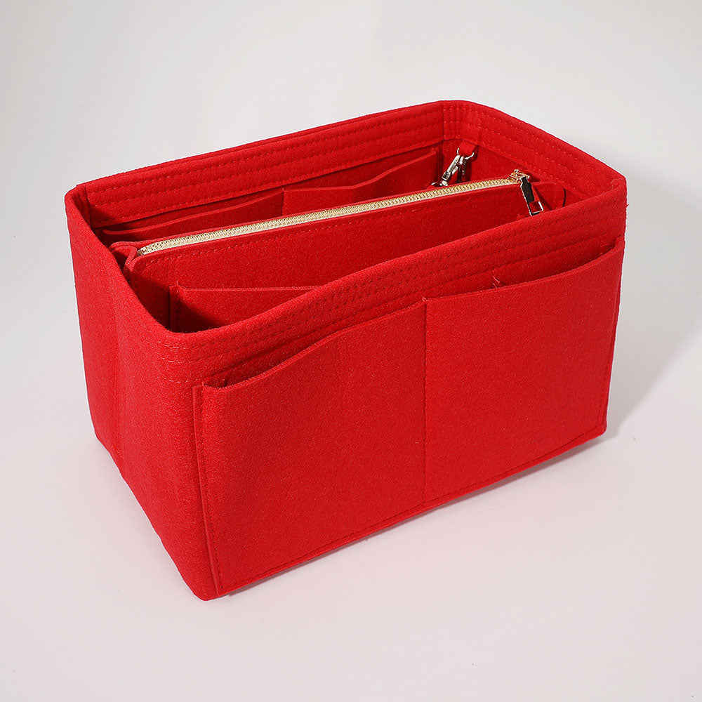 Red handbag organizer insert with front pockets and a zippered compartment.