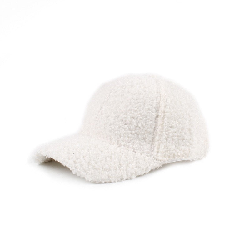 White textured baseball cap on a white background.